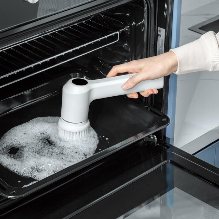 how to clean the oven with an electric leaning brush